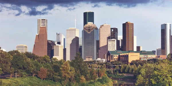 a view of a city with tall buildings