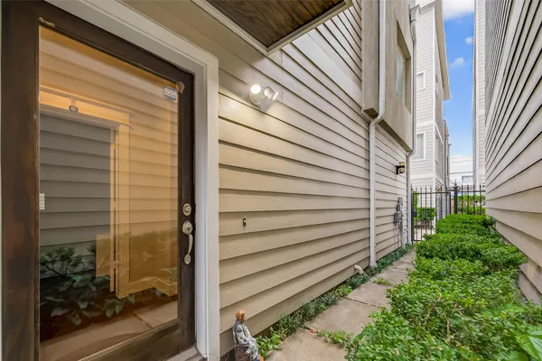 a view of a door in front of a house