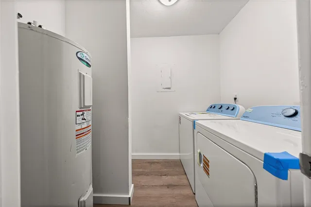 a utility room with dryer and washer