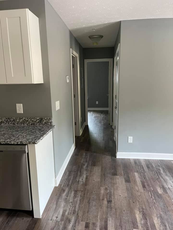130 Main Street South, Unit 2 Carthage, TN 37030 - Photo 5 of 9 a view of a hallway with wooden floor and cabinets