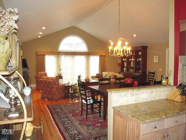 306 Danbury Road, Unit 7 Wilton, CT 06897 - Photo 1 of 1 a view of a dining room and livingroom view