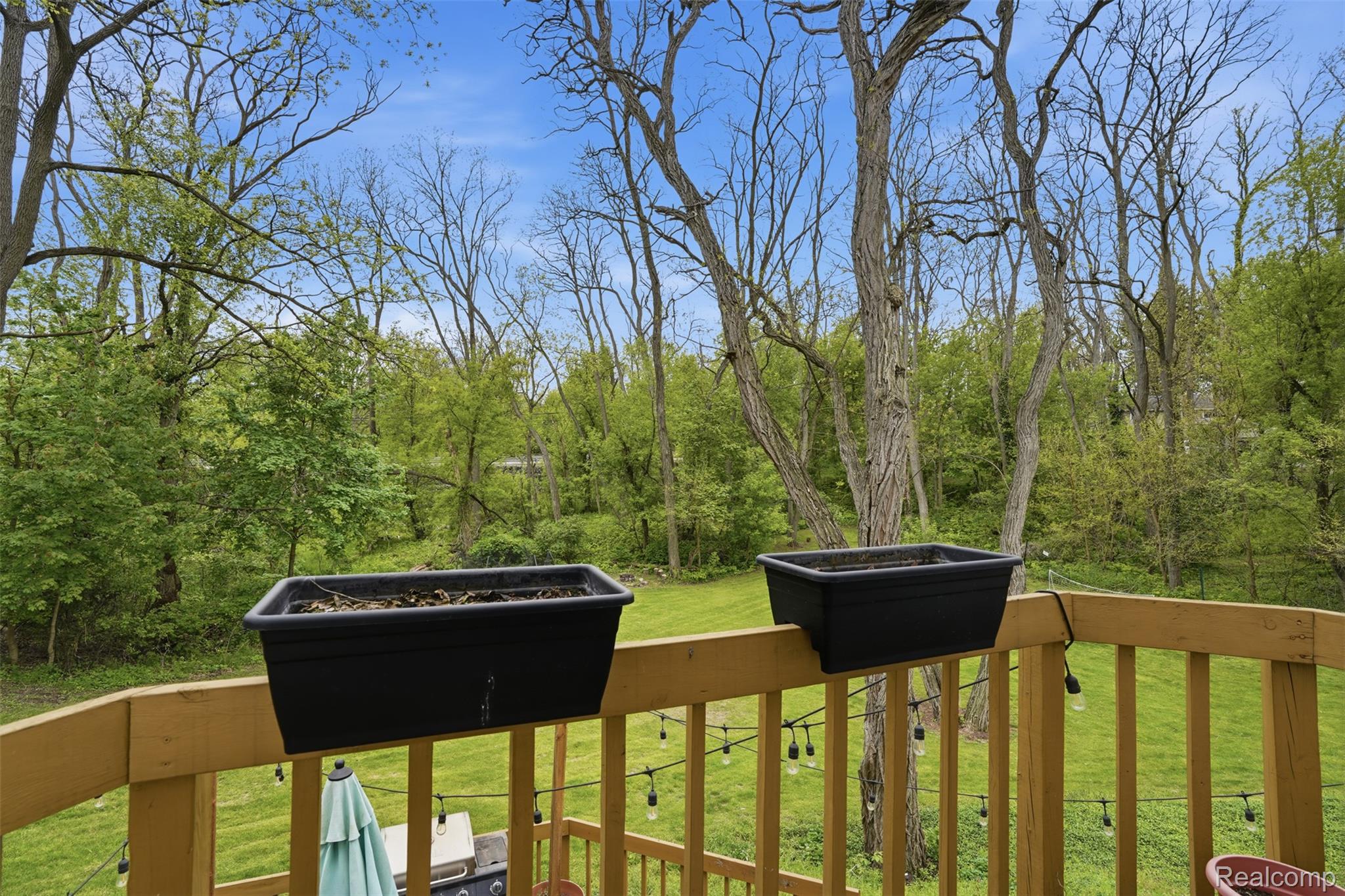 47129 Dunsany Road Northville, MI 48167 - Photo 38 of 49 Wooden terrace featuring a lawn
