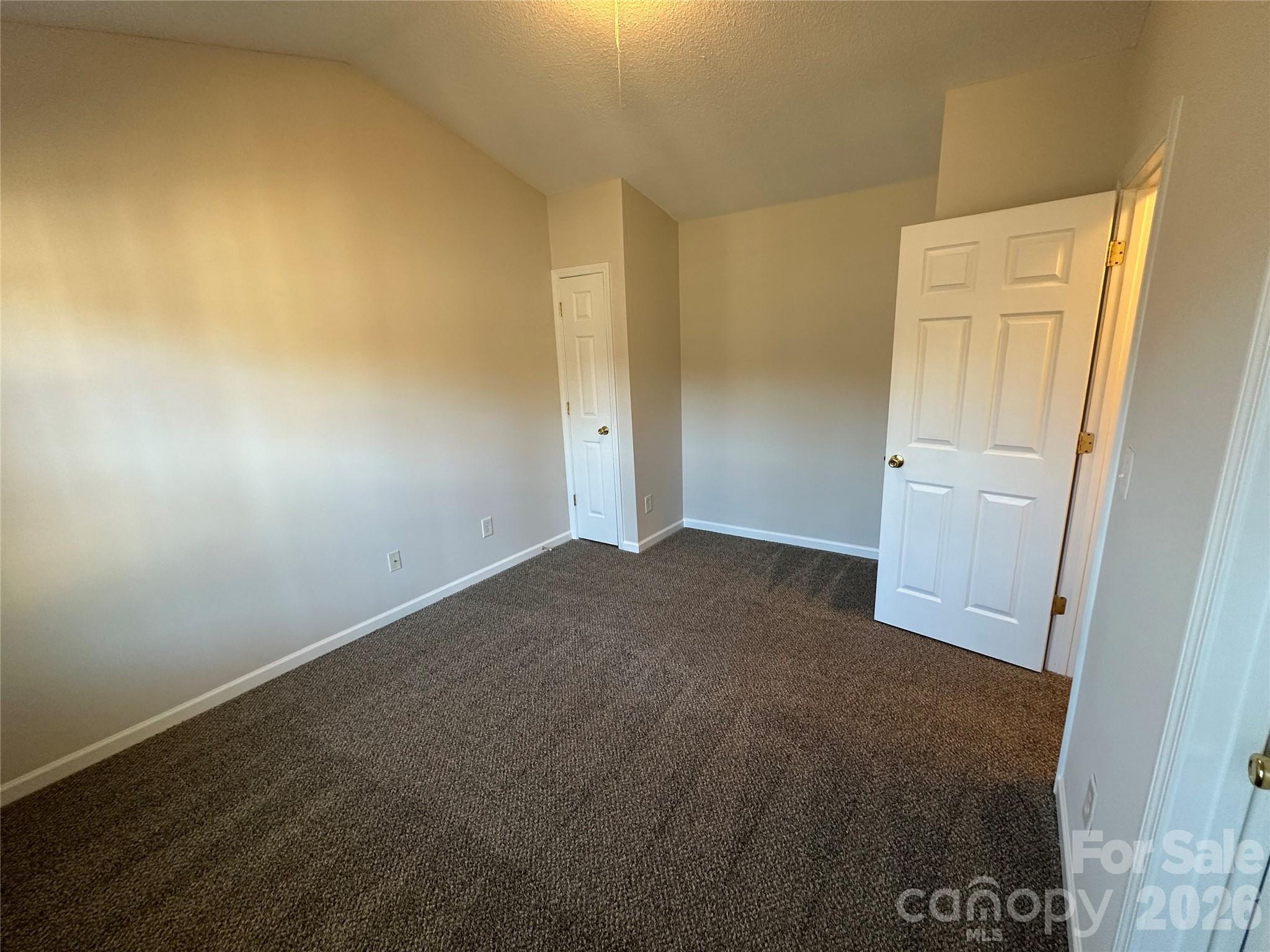 5227 Magnolia Tree Lane Charlotte, NC 28215 - Photo 17 of 20 an empty room with closet