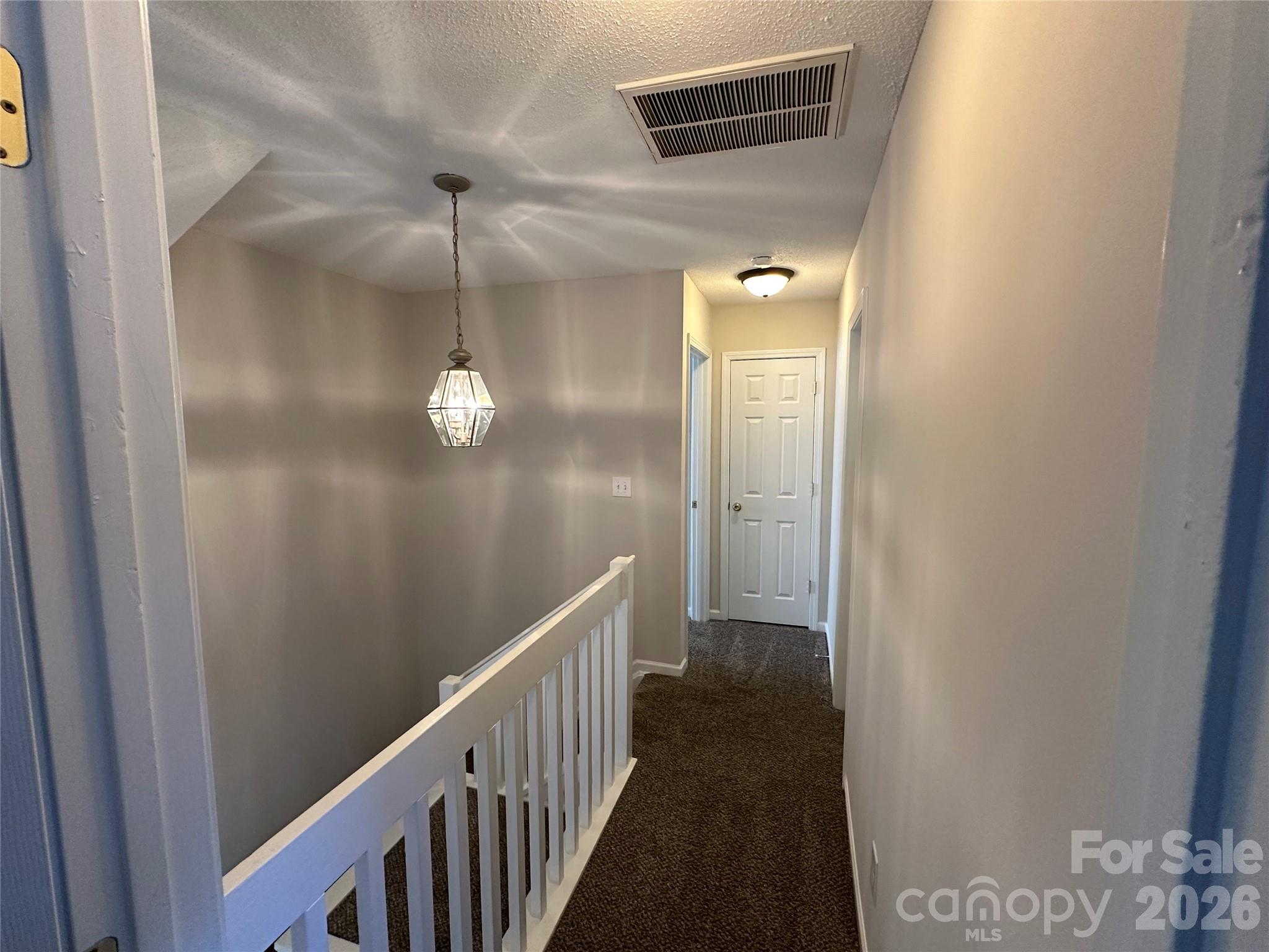 5227 Magnolia Tree Lane Charlotte, NC 28215 - Photo 8 of 20 a view of a hallway