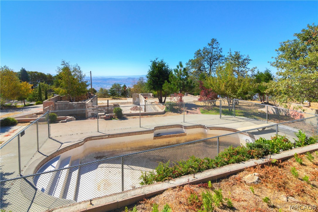 26262 Highway 18 Rimforest, CA 92378 - Photo 12 of 24 a view of swimming pool from a balcony