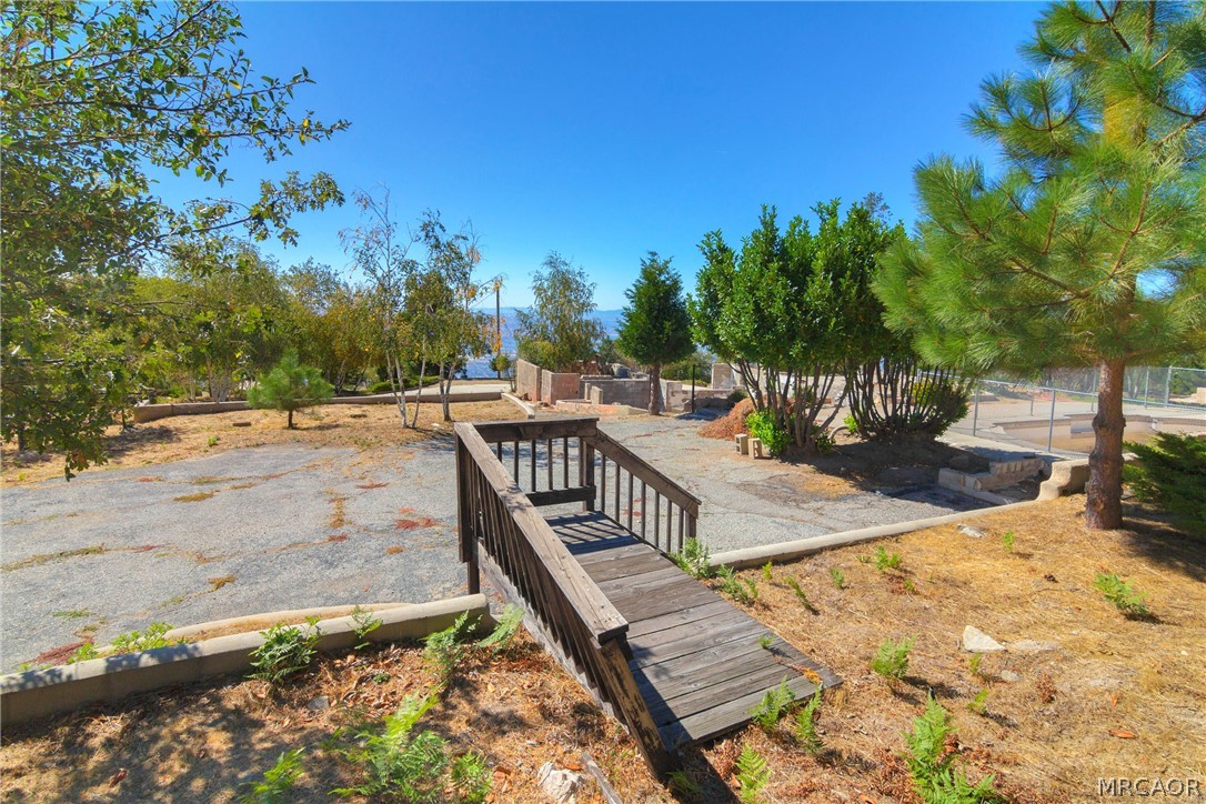 26262 Highway 18 Rimforest, CA 92378 - Photo 13 of 24 a view of swimming pool with a patio