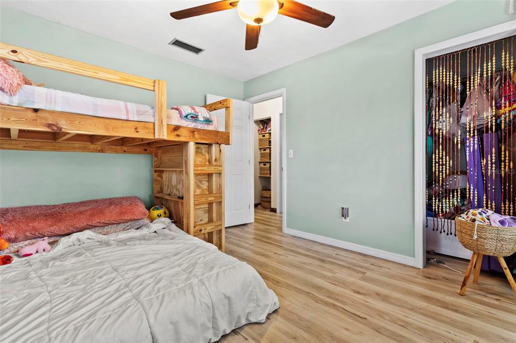 6221 Dalton Street Spring Hill, FL 34606 - Photo 20 of 40 a bedroom with a bed and a window