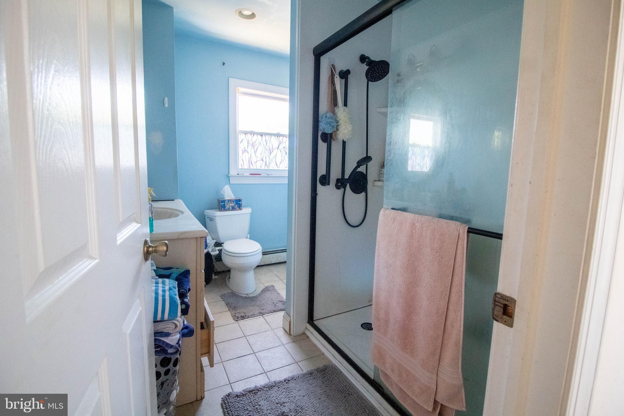 100 Grant Street Riverside, NJ 08075 - Photo 22 of 34 a bathroom with a toilet and a shower