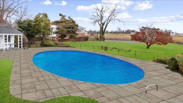 a view of a swimming pool with an outdoor space