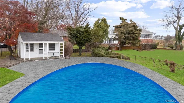 a view of outdoor space yard and swimming pool