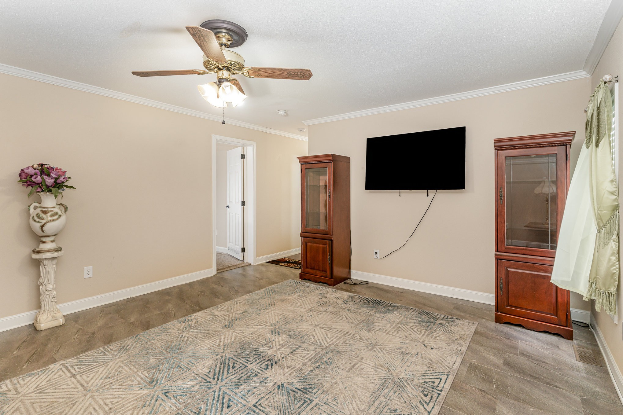 4075 Woodard Road Springfield, TN 37172 - Photo 18 of 30 a view of a livingroom with a flat screen tv