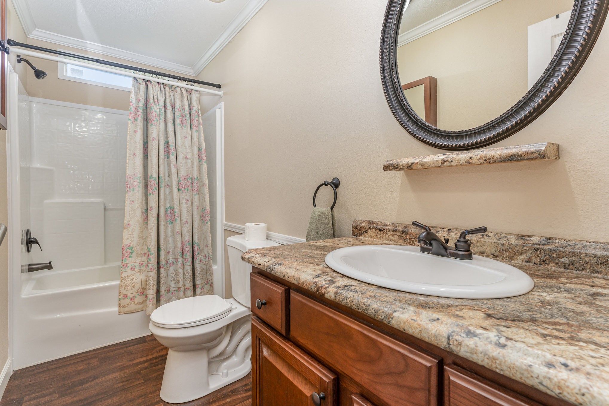 4075 Woodard Road Springfield, TN 37172 - Photo 23 of 30 a bathroom with a granite countertop sink a toilet and a mirror