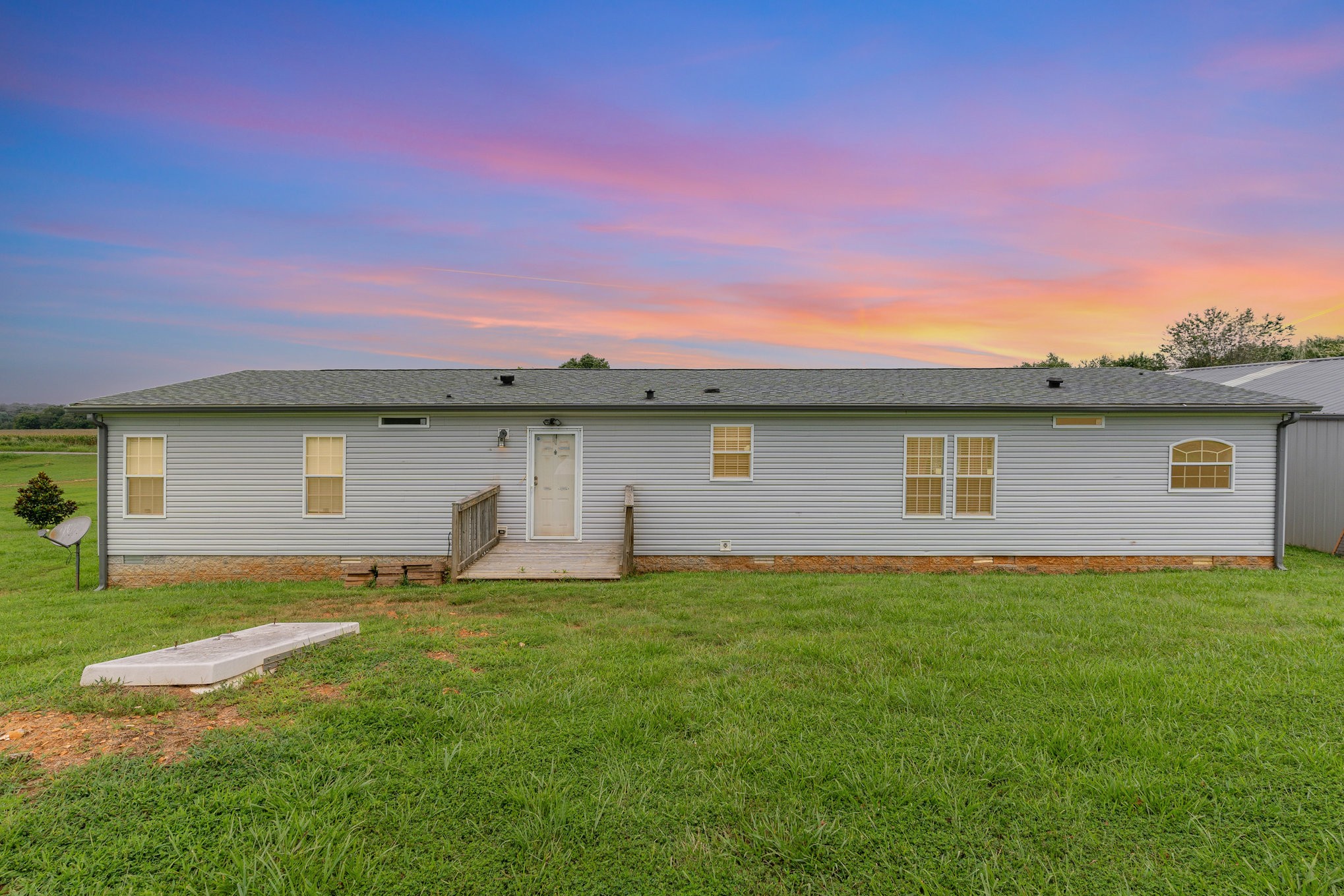 4075 Woodard Road Springfield, TN 37172 - Photo 28 of 30 a front view of a house with a yard and garage
