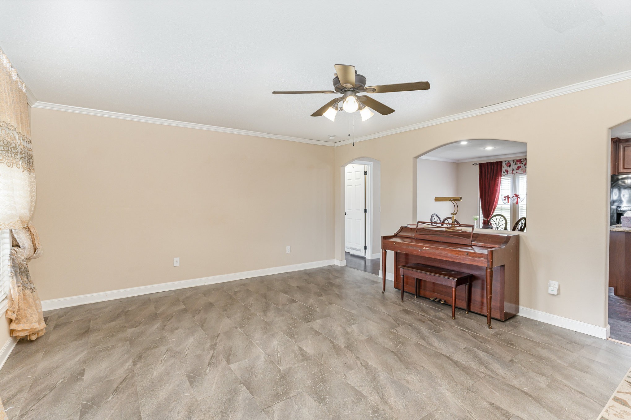 4075 Woodard Road Springfield, TN 37172 - Photo 6 of 30 a view of room with a ceiling fan and wooden floor