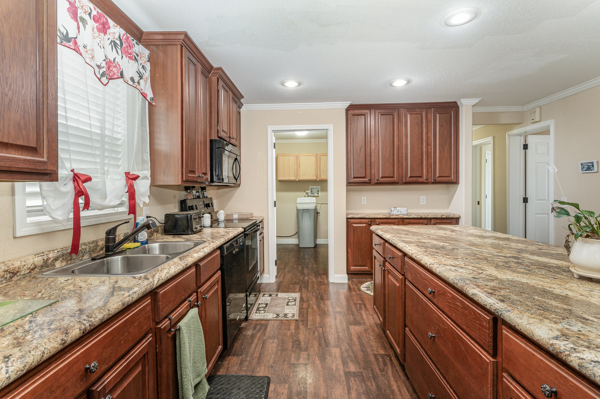 4075 Woodard Road Springfield, TN 37172 - Photo 8 of 30 a kitchen with stainless steel appliances granite countertop a sink stove and refrigerator