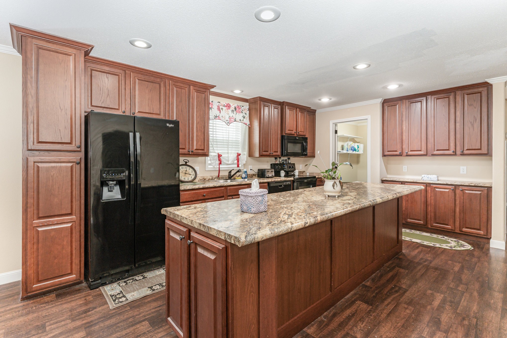 4075 Woodard Road Springfield, TN 37172 - Photo 9 of 30 a kitchen with stainless steel appliances granite countertop a refrigerator stove microwave and sink