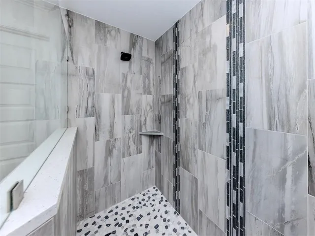 a view of a utility room with wooden floor