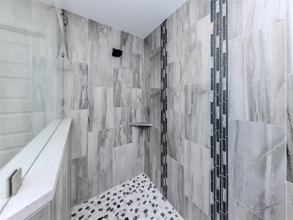 65 Fairway Road Rotonda West, FL 33947 - Photo 25 of 40 a bathroom with a shower and a sink