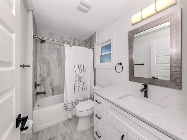 a view of a storage and utility room with closet