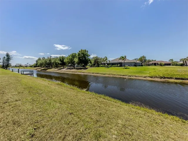 a view of a lake with a houses