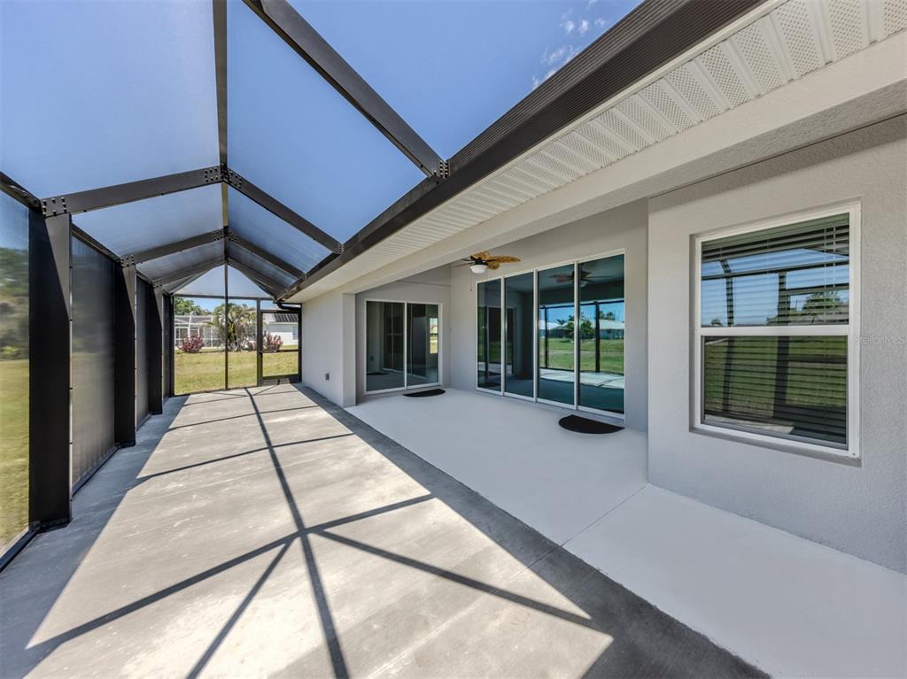 65 Fairway Road Rotonda West, FL 33947 - Photo 7 of 40 a view of a house with a porch