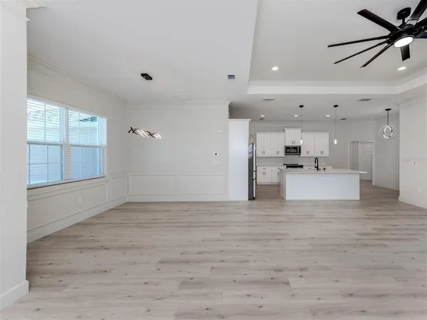 a view of a kitchen with a sink and dishwasher