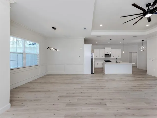 a view of a kitchen with a sink and dishwasher