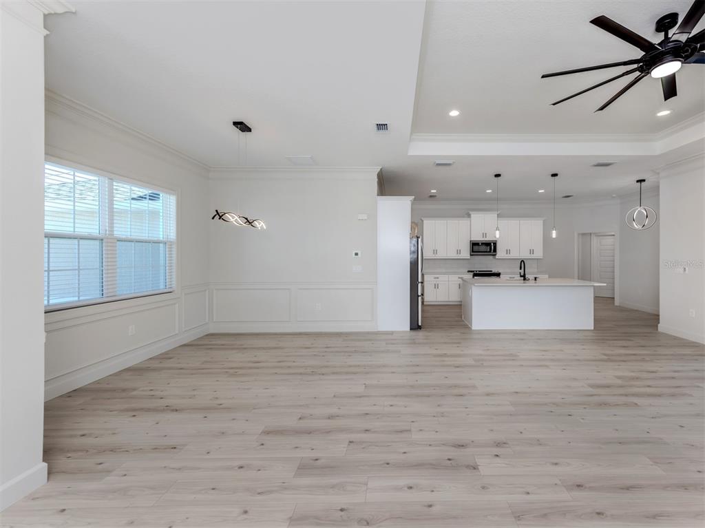 65 Fairway Road Rotonda West, FL 33947 - Photo 10 of 40 a view of a kitchen with a sink and dishwasher