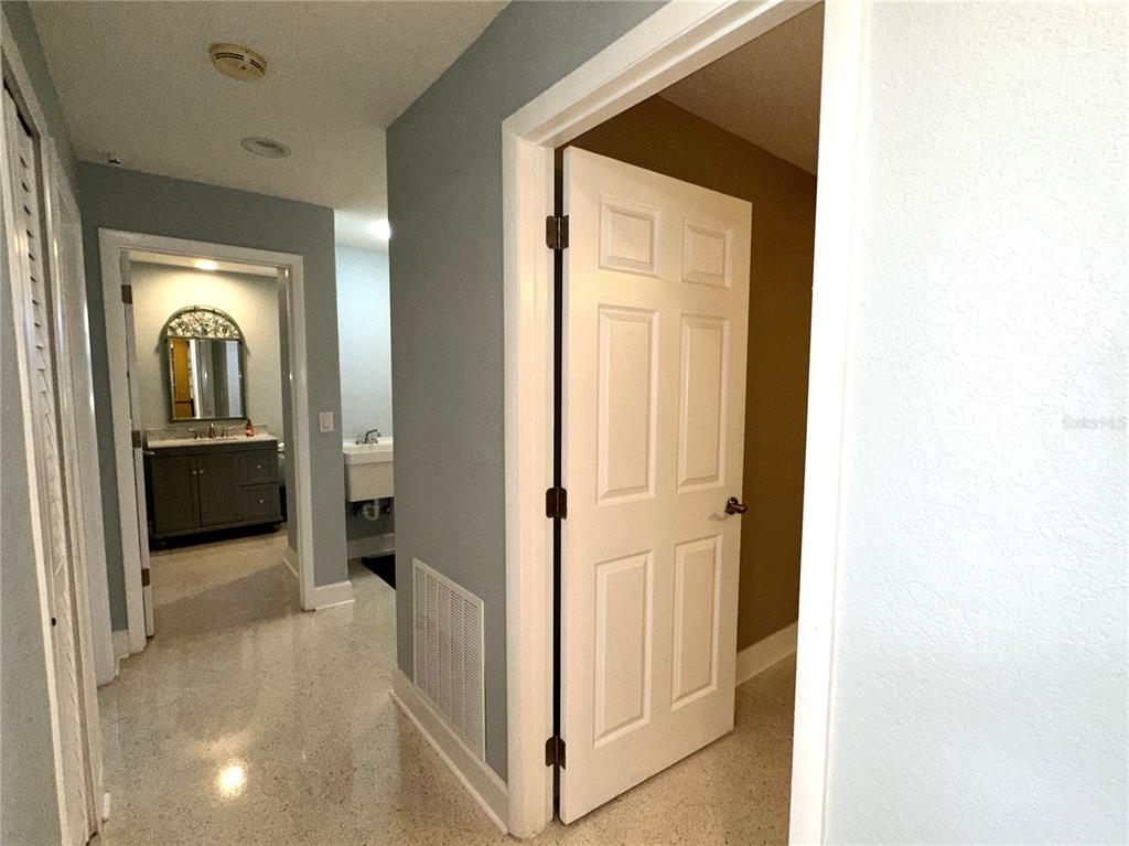 1883 Riviera Circle Sarasota, FL 34232 - Photo 23 of 45 a view of a hallway with closet and bathroom