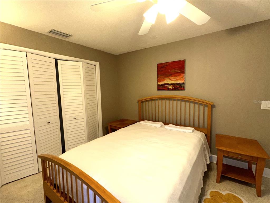 1883 Riviera Circle Sarasota, FL 34232 - Photo 26 of 45 a bedroom with a bed and a window