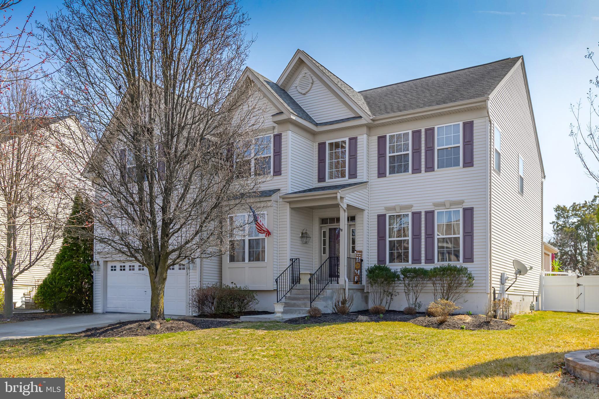 a front view of a house with a yard outdoor outdoor seating and yard