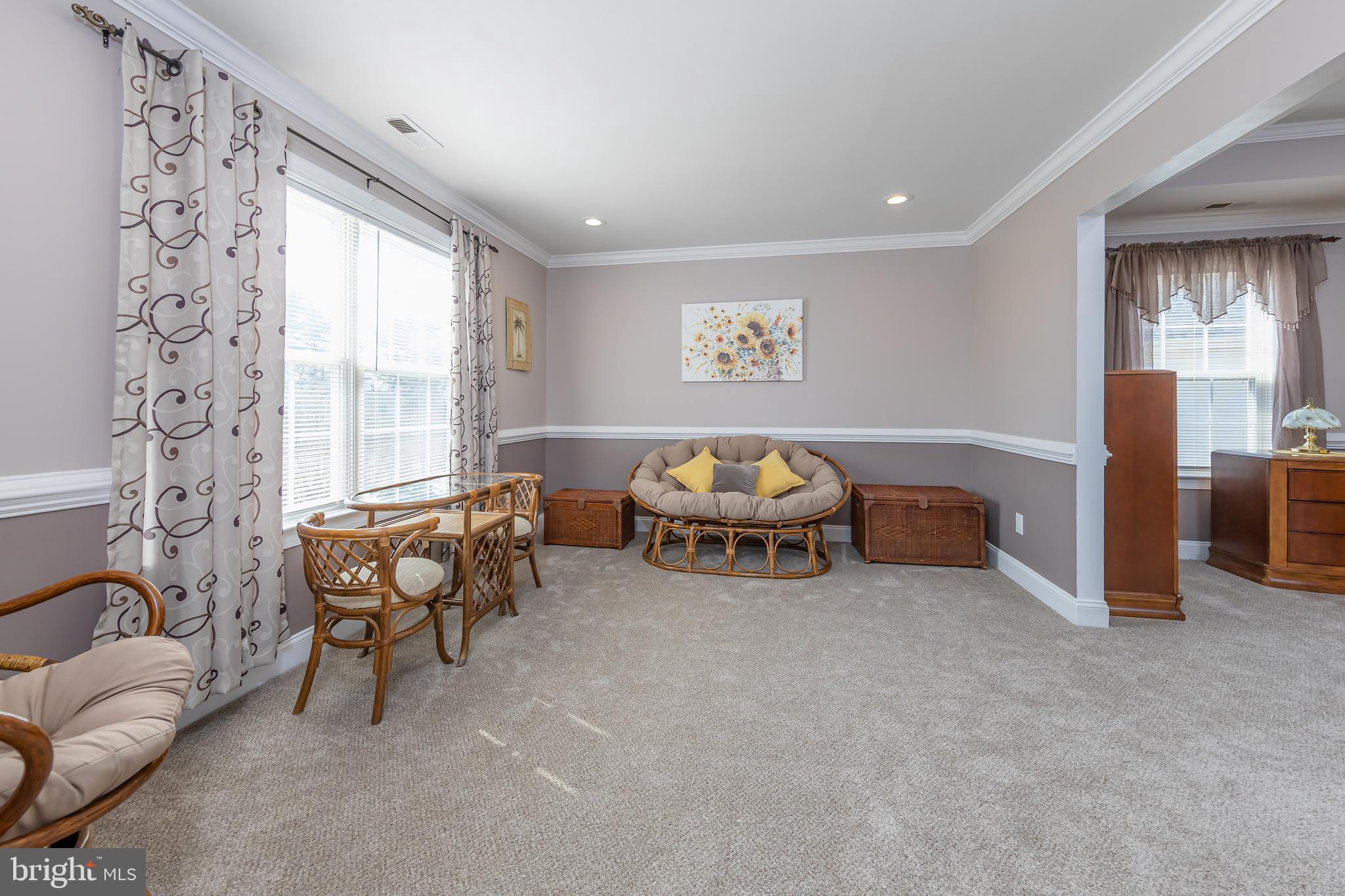 612 Bainbridge Drive Mullica Hill, NJ 08062 - Photo 22 of 42 a living room with furniture and window