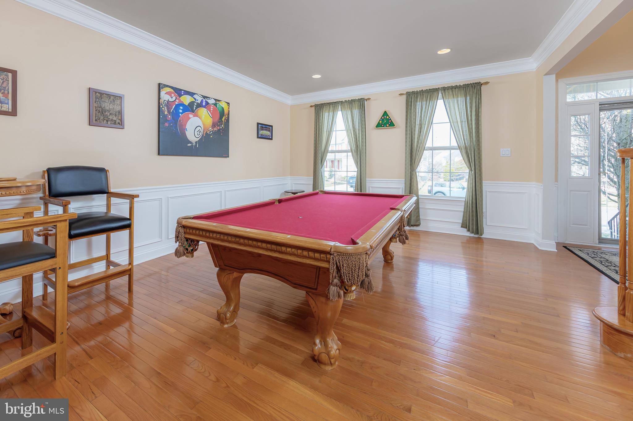 612 Bainbridge Drive Mullica Hill, NJ 08062 - Photo 6 of 42 a living room with furniture a flat screen tv and a pool table
