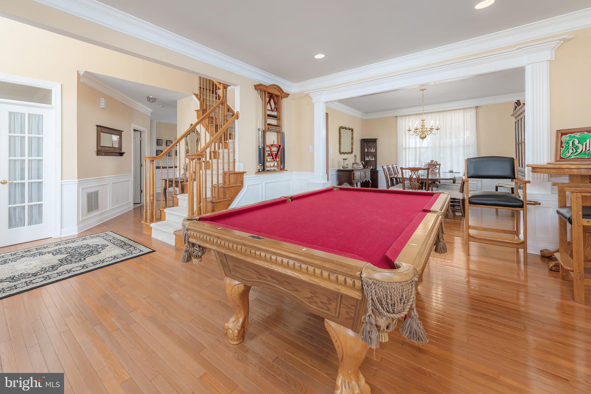 612 Bainbridge Drive Mullica Hill, NJ 08062 - Photo 7 of 42 a living room with furniture pool table and wooden floor