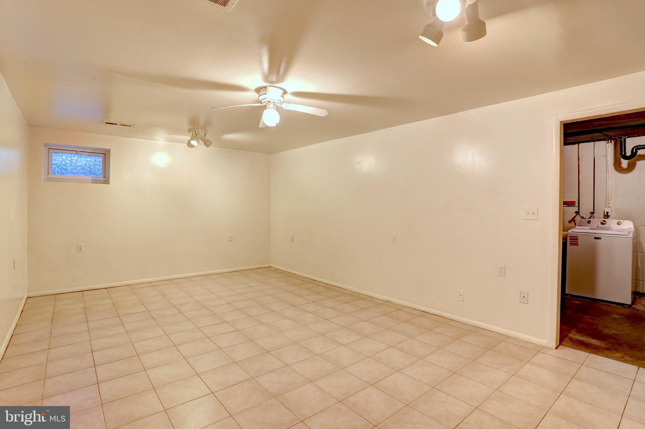 9110 Tumbleweed Run, Unit G Laurel, MD 20723 - Photo 19 of 32 wooden floor in an empty room