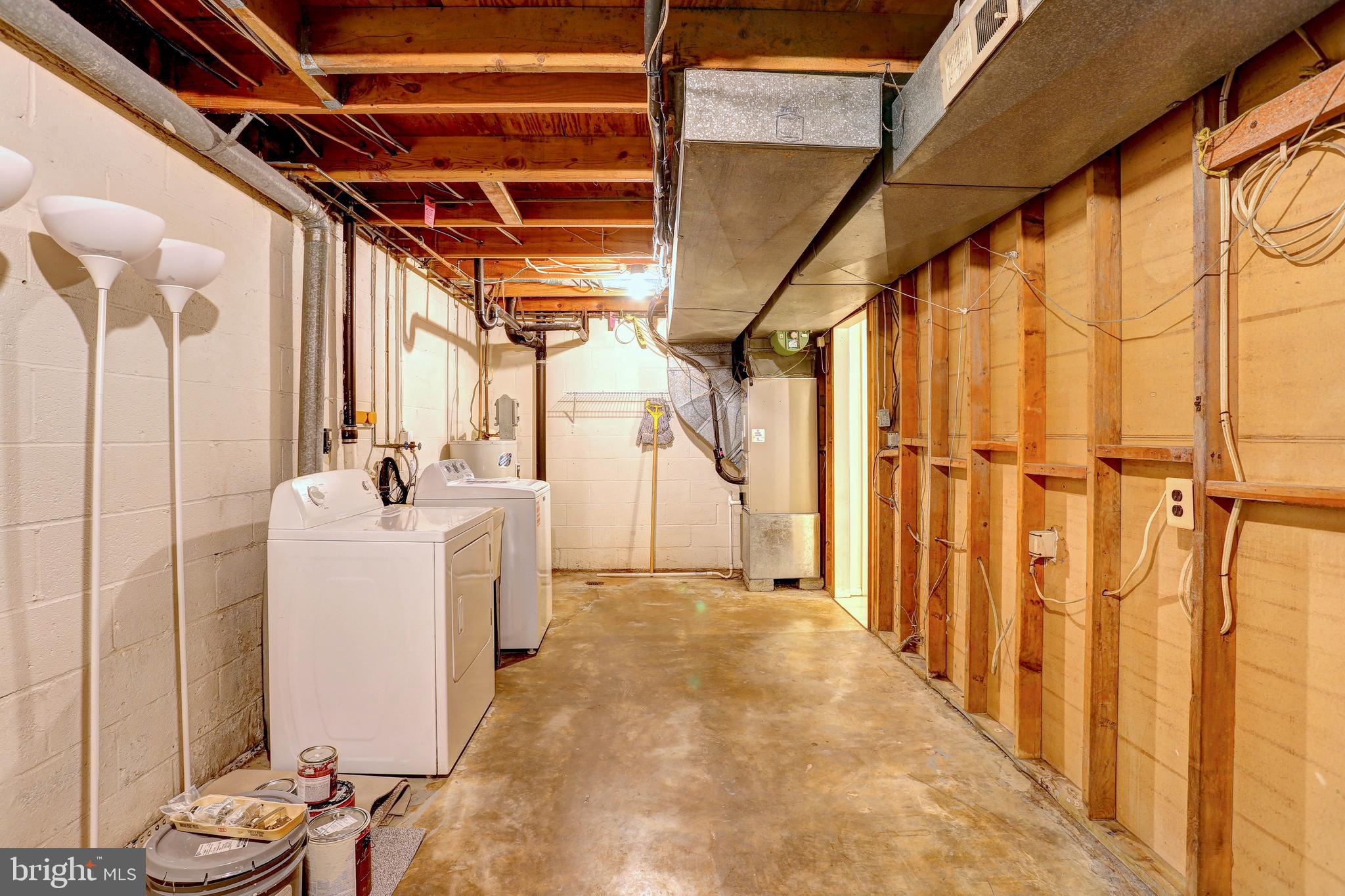 9110 Tumbleweed Run, Unit G Laurel, MD 20723 - Photo 22 of 32 a view of storage and utility room