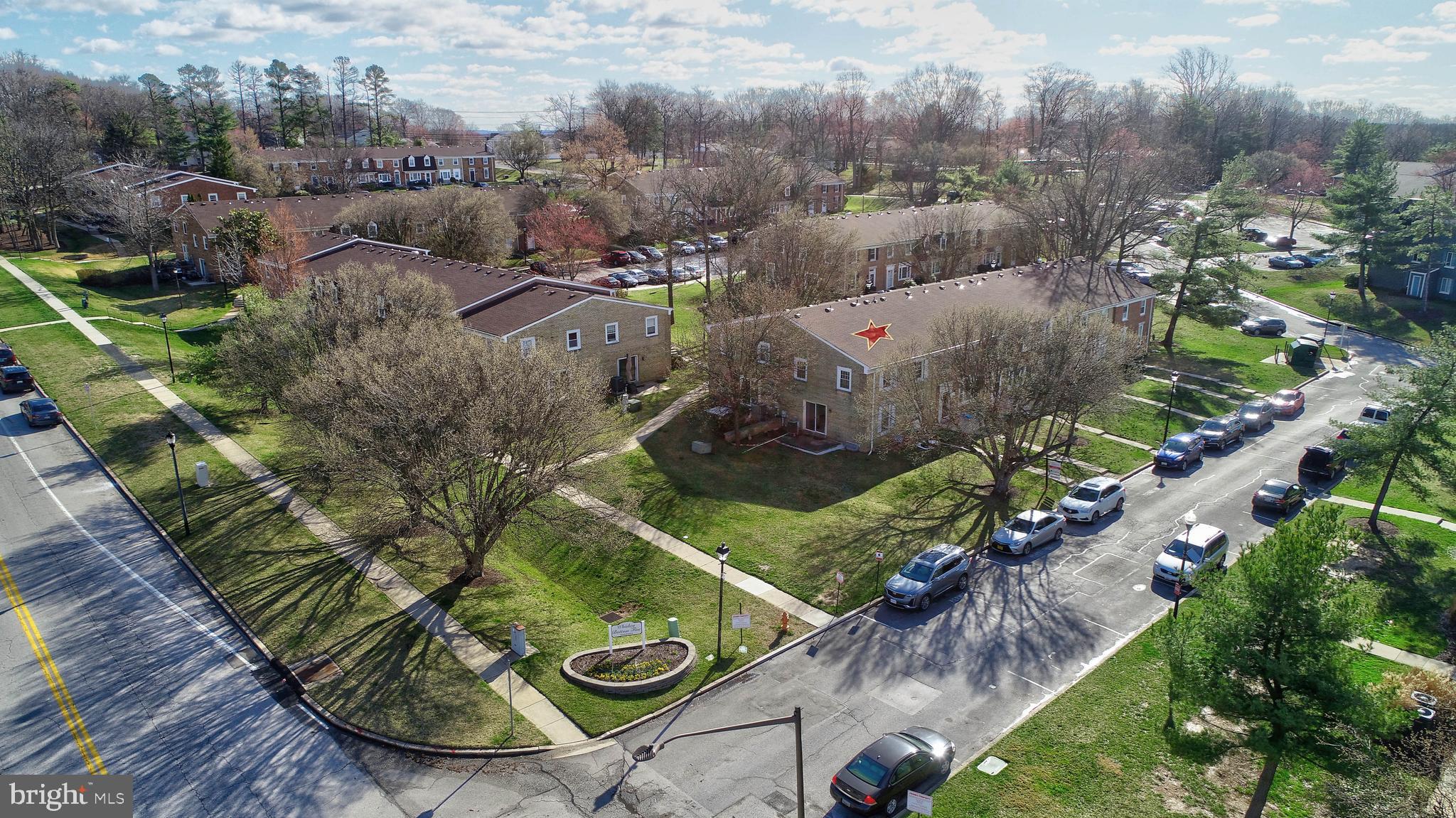 9110 Tumbleweed Run, Unit G Laurel, MD 20723 - Photo 25 of 32 an aerial view of a house with outdoor space