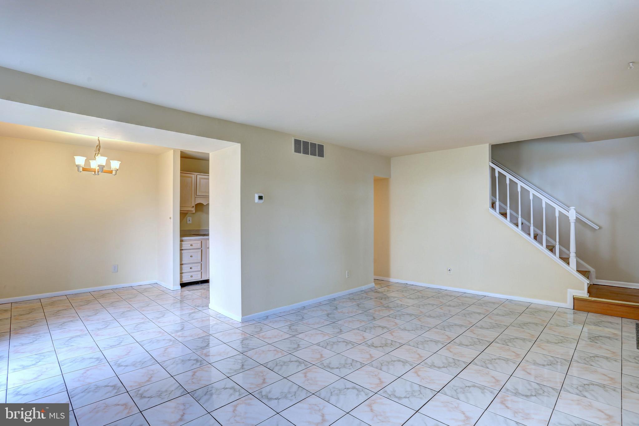 9110 Tumbleweed Run, Unit G Laurel, MD 20723 - Photo 4 of 32 a view of an entryway with a window