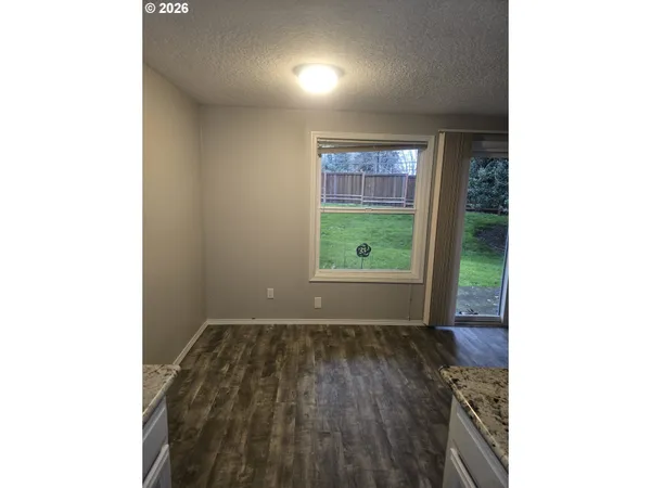 a house view with a garden space