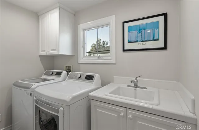 a view of a patio with table and chairs and potted plants