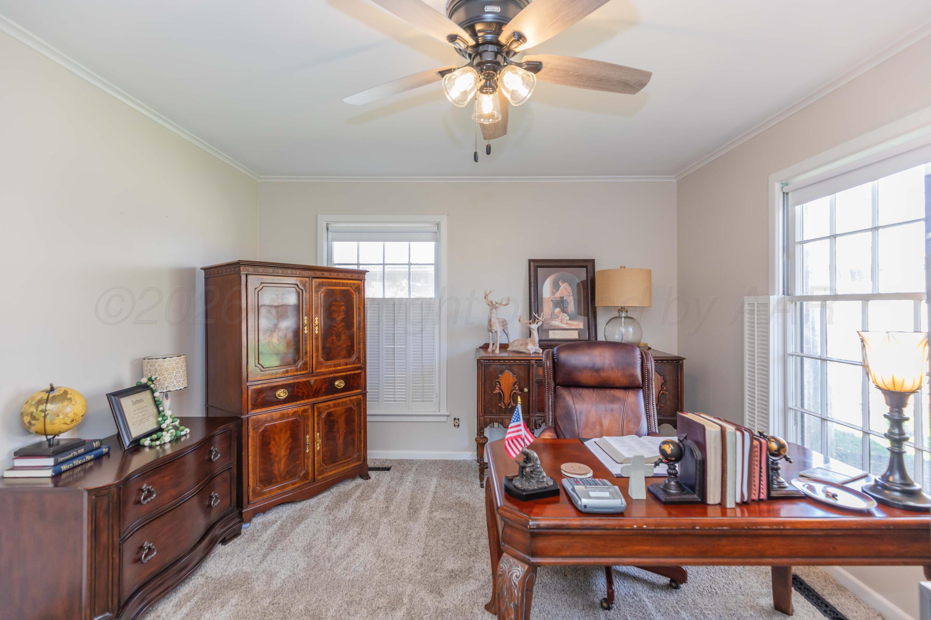 6308 Jameson Road Amarillo, TX 79106 - Photo 29 of 43 a dining room with furniture and window