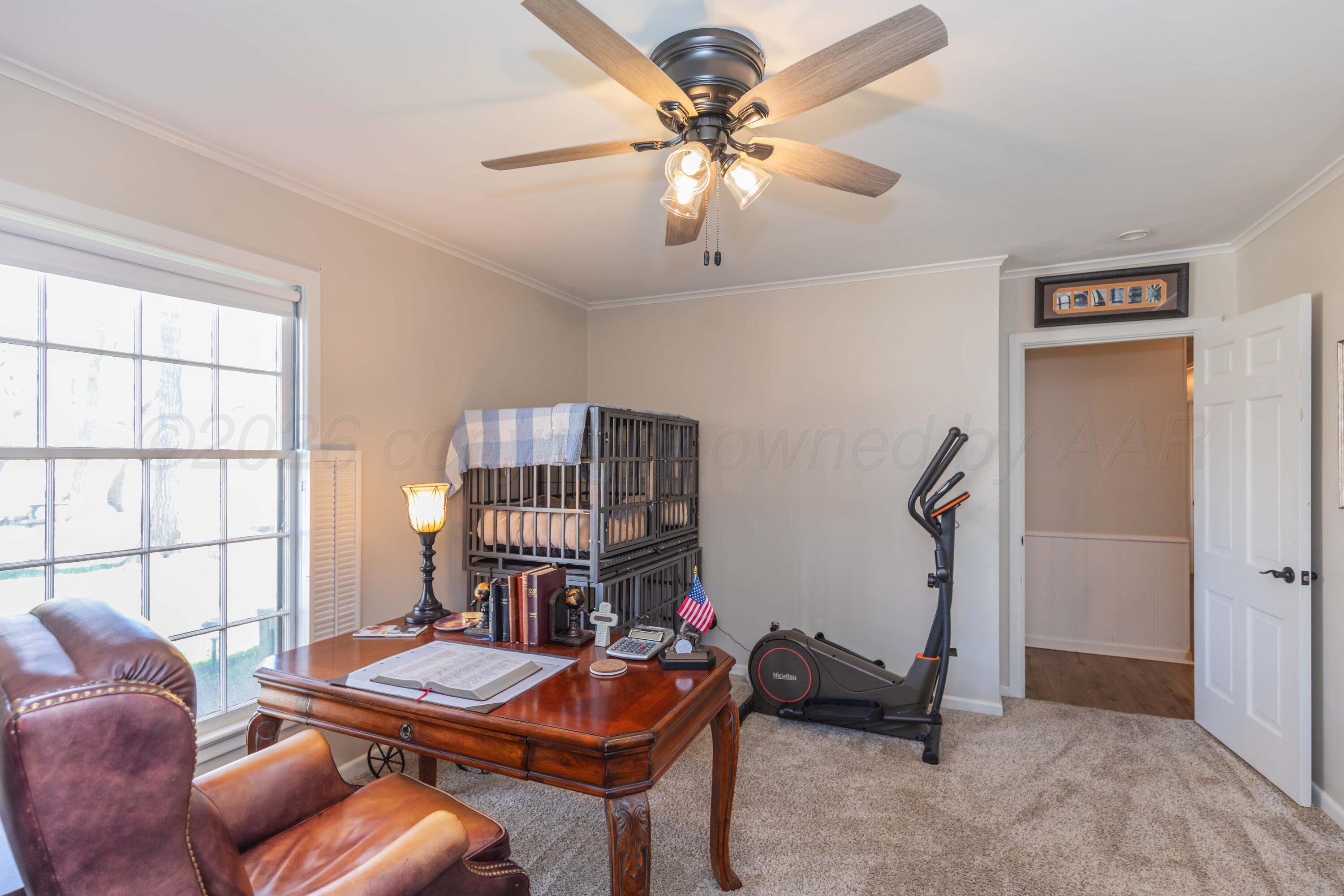 6308 Jameson Road Amarillo, TX 79106 - Photo 30 of 43 a room with furniture and a chandelier
