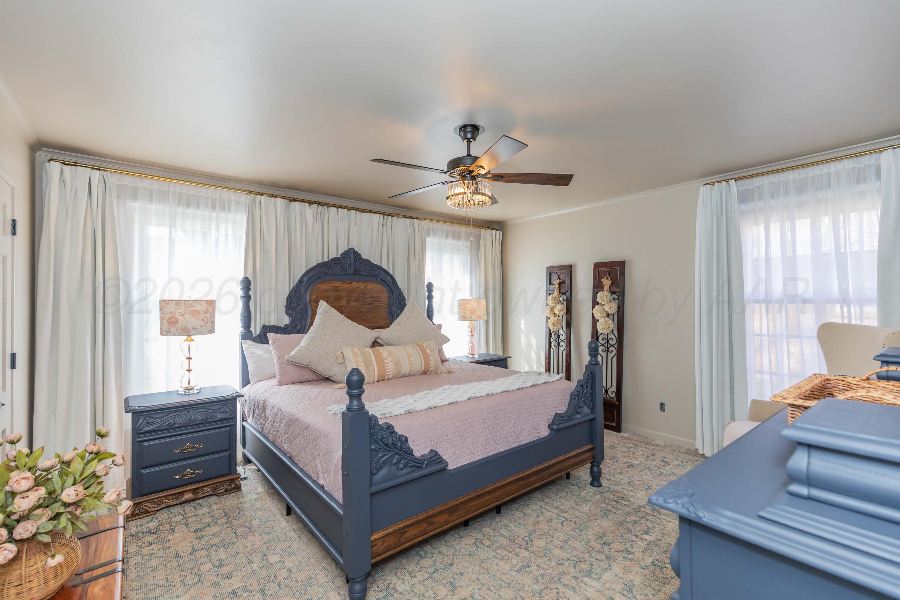 6308 Jameson Road Amarillo, TX 79106 - Photo 31 of 43 a bedroom with a bed and a window