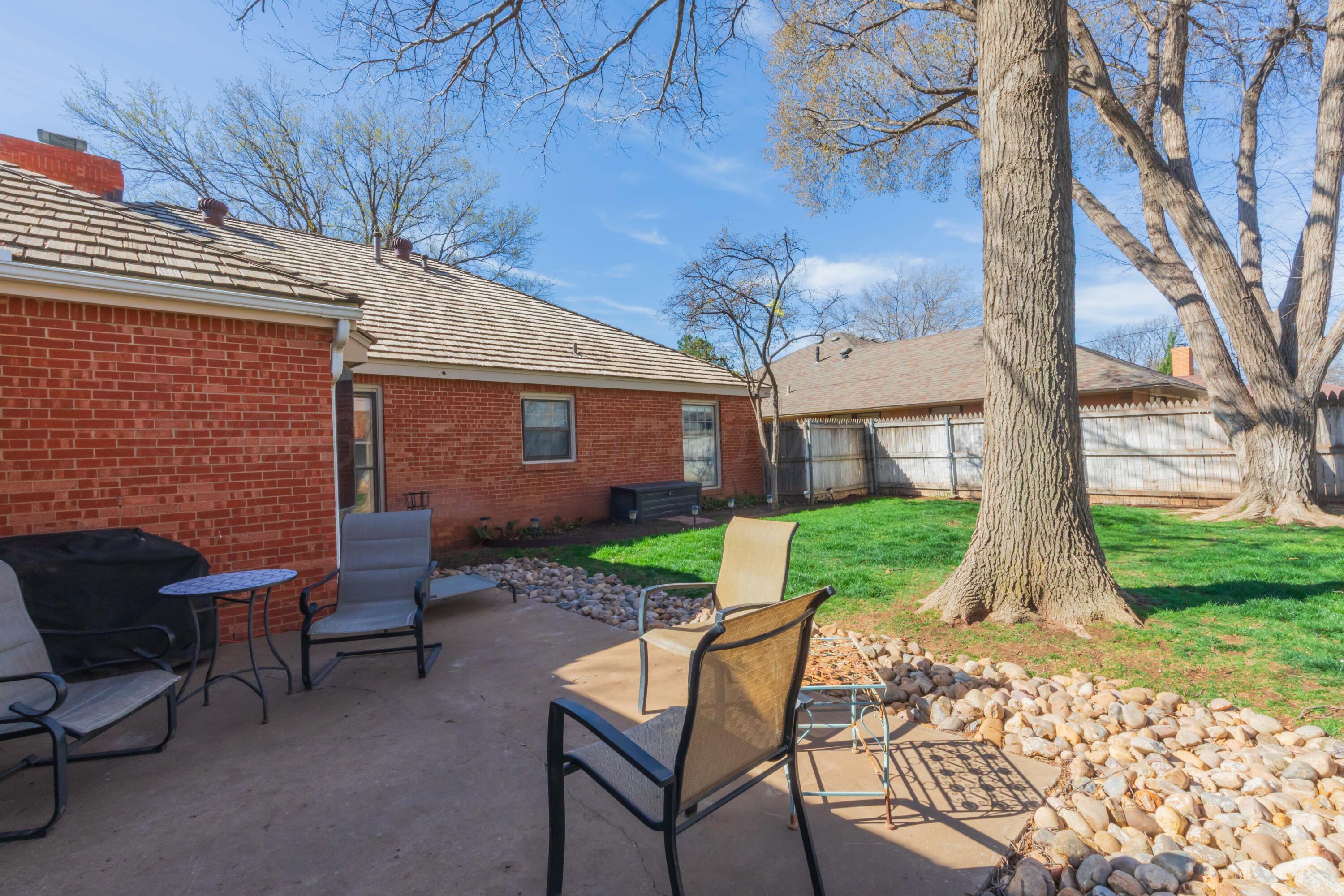 6308 Jameson Road Amarillo, TX 79106 - Photo 41 of 43 a view of backyard with outdoor seating and green space