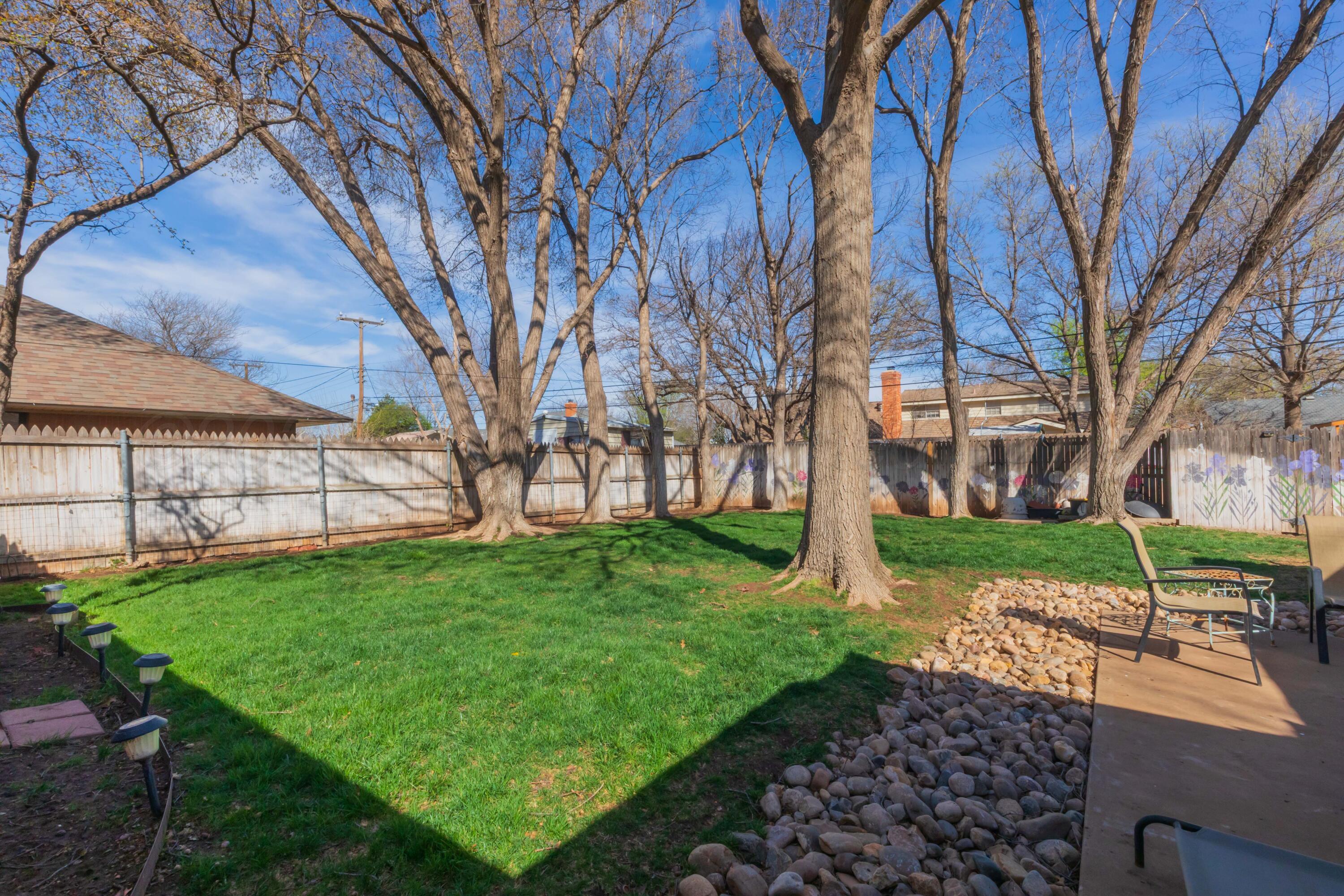 6308 Jameson Road Amarillo, TX 79106 - Photo 42 of 43 a view of backyard with tree