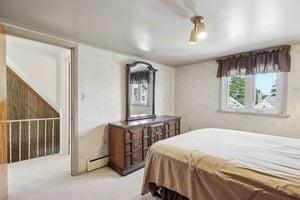 533 A Walnut Street Vandergrift, PA 15690 - Photo 21 of 46 a bedroom with a bed and a window