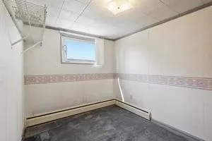 an entryway view with wooden floor