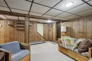 a kitchen with a table and chairs in it