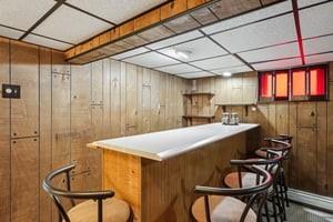 533 A Walnut Street Vandergrift, PA 15690 - Photo 36 of 46 a kitchen with a table chairs and refrigerator