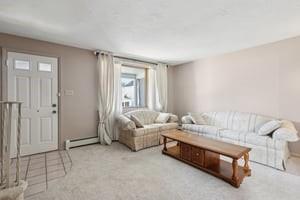 533 A Walnut Street Vandergrift, PA 15690 - Photo 7 of 46 a room with a bed and a couch